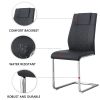 Table and chair set. (1 table+4 black chairs) Round dining table with a 40 inch diameter glass tabletop and silver plated metal legs. 4 black PU chair