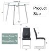 Table and chair set. (1 table+4 black chairs) Round dining table with a 40 inch diameter glass tabletop and silver plated metal legs. 4 black PU chair