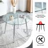 Table and chair set. (1 table+4 black chairs) Round dining table with a 40 inch diameter glass tabletop and silver plated metal legs. 4 black PU chair