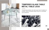 Table and chair set. (1 table+4 black chairs) Round dining table with a 40 inch diameter glass tabletop and silver plated metal legs. 4 black PU chair